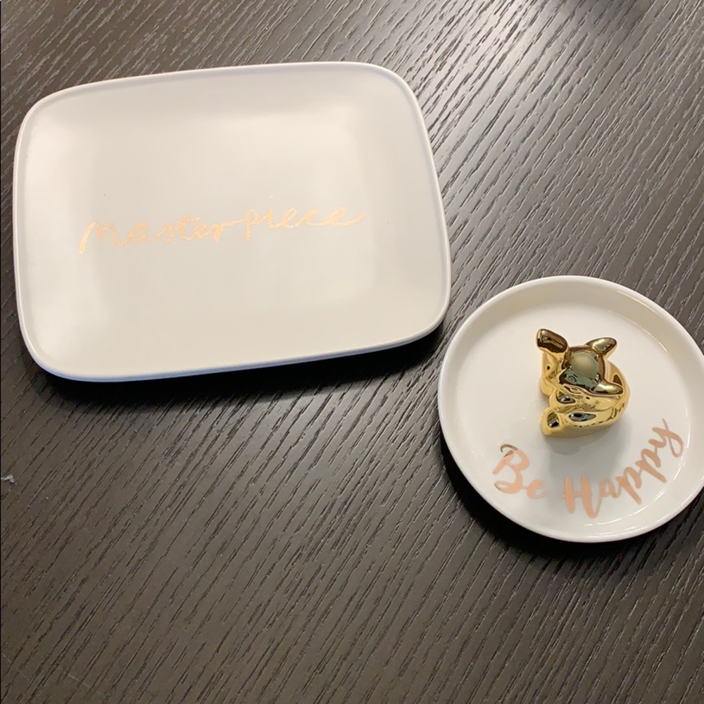 Ring and jewelry holder.